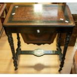 A 19th Century sewing table, burr walnut and ebonised, inlaid detail and turned legs