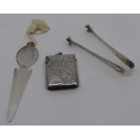 An Edwardian silver vesta case with engraved decoration, Birmingham 1903, a silver bookmark and a