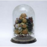 A Victorian glass dome of waxed fruits circa 1880, raised upon an openwork basket, enriched with