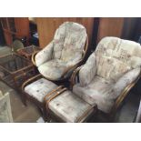 A cane conservatory suite to include one swivel arm chair H 106 cms, a static arm chair H 91 cms,