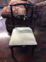 A striking Regency mahogany dining chair, circa 1805, rope twist top rail, pierced crest rail on