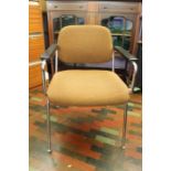 A good 1970 chrome and black armrest, open arm chair, mid 70s