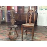 A sweet late Victorian single oak chair with rounded back, pierced central roundel splat, on solid