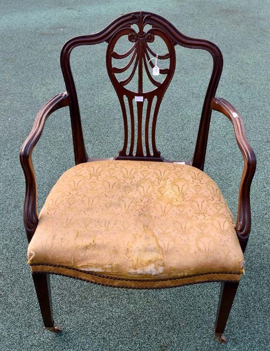 A good George III mahogany oak open armchair, the wavy back with anthemion pierced splats, shaped