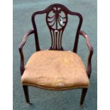 A good George III mahogany oak open armchair, the wavy back with anthemion pierced splats, shaped
