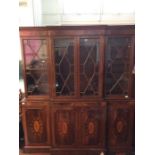 A large reproduction two piece display cabinet, inlaid mahogany effect