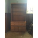 Two Nathan furniture side units; one walnut with three open shelves above two columns of two drawers