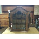 An oak wall hanging cupboard, glazed front and sides, opening to reveal two wooden shelves, H 69