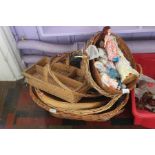 A large collection of various wicker baskets (4), various serving dishes in wicker and a cutlery box