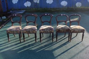 A good set of five early Victorian mahogany dining chairs, the rounded backs and curved crest rails,