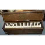 An early 20th century dulcitone portable piano by Thomas Machell & Sons, Glasgow, Scotland. Foldable
