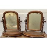 A pair of dressing table mirrors in mahogany with turned supports