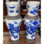 A pair of late 19th century hand painted Chinese vases