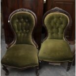 Three Victorian mahogany framed nursing chairs one with arms, velvet upholstery serpentine front,