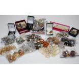 A quantity of costume jewellery including simulated pearls, gilt metal etc