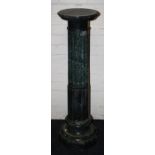 A green marble pedestal, the tapered fluted column raised on an octagonal base, H110cm and another