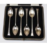 A set of six Art Deco silver spoons possibly for grapefruit or melon, cased, Sheffield 1935, British