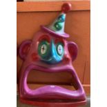 Fairground Interest: A vintage fairground fibreglass clown head ball throwing game topper. 70 x 50