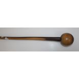 A lignum vitae knobkerrie, with ball head and tapering shaft, 65cm