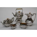 A six piece silver and ivory tea/coffee set, the oblong bodies with discreet Art Nouveau decoration,