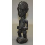 A Songye-Luba style fetish figure, Republic of Congo. H40cm