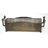 An early 20th century Arts and Crafts hammered copper table jardinaire with twin Gothic handles