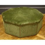 A modern large octagonal pouffe upholstered in tacked down green velvet dralon, d 112cm