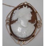 A 9ct rose gold mounted oval Cameo brooch depicting bust portrait of a lady, in scroll mount, 13.6g
