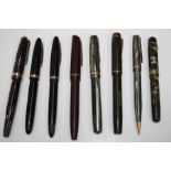 A Watermans ideal fountain pen with marbled case and 14kt gold nib, a Parker Duofold fountain pen,