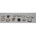 Seven various rings set cubic zirconia, a dress ring set synthetic sapphire and five other dress