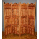 A mid 20th century Indian teak modesty screen with four geometrically pierced panels, on stile