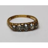 An 18ct gold hallmarked half hoop, old cut diamond ring, five stones approx.. carat weight 1.5cts,