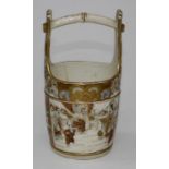 A Japanese Satsuma pail, Meiji period, decorated with reserves of insects, figures and geometric