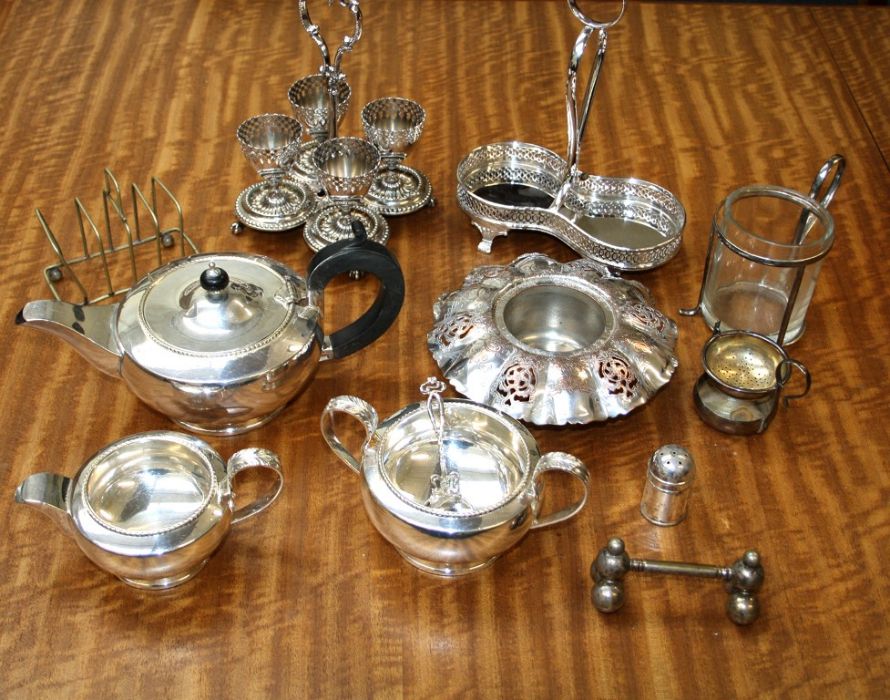 A quantity of silver plate including a three piece bachelors tea set, a double condiment stand and