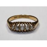 A diamond S stone ring, size Q, 18ct, hallmarked Birmingham 1942, approx. 0.30ct diamond