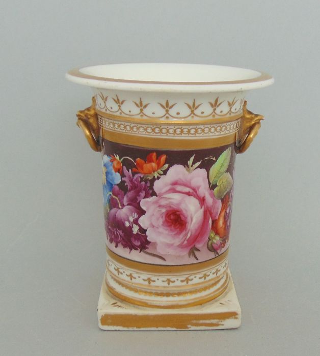 A Coalport Vase with Birds Beak and ring handles. Painted with a deep band of flowers, and gilt