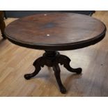 Victorian mahogany oval breakfast table on tripod legs along with four matching mahogany dining