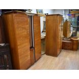 A 'Beautility' walnut-effect bedroom suite circa 1960 comprising a large double wardrobe, single