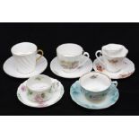 A collection of five 19th/early 20th Century Continental moustache cups and saucers to include: 1.