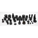 A large collection of Victorian / Edwardian ebony dressing table jars, ring stands, boxes etc