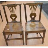 Pair of George II oak chairs with pierced splat of back rail.