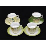 A group of  four Continental probably Finish Art Nouveau moustache cup and saucers, Helsinki,
