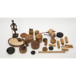 A collection of contemporary and mid 20th Century treen items comprising pots, puzzles, spinning