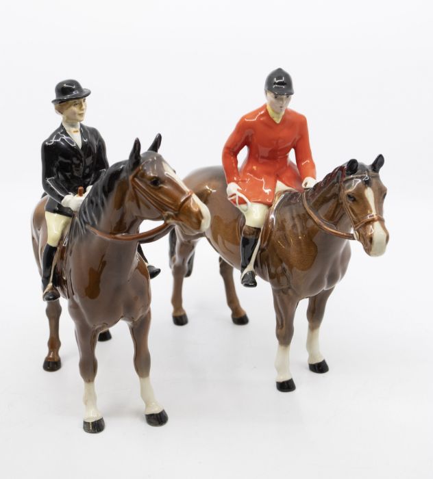 Beswick: A huntsman on horse, together with a huntswoman on horse