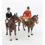 Beswick: A huntsman on horse, together with a huntswoman on horse