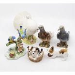 A collection of Beswick birds, Royal Doulton dogs and an Adderly bird (6)