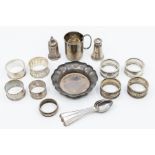 A collection of silver to include: a Victorian Chinoiserie napkin ring, the body chased with figures