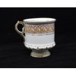 A late 19th Century Austrian moustache cup, Etruscan style white ground, painted with a band of
