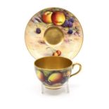 A Royal Worcester fruit pattern cup and saucer with gilt interior, signed by WH Austin on cup and W.