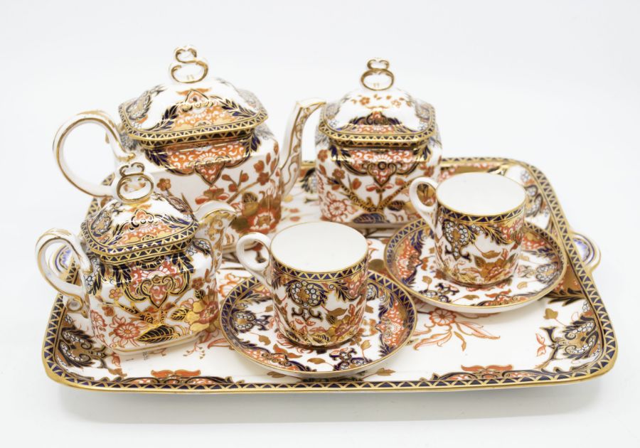 A Royal Crown Derby Old Imari tea for two on tray, along with 6 cups and saucers and a bowl